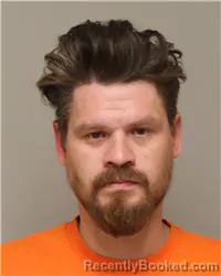 Mugshot of NATHAN DANIEL HOLMES booked in Anoka County, Minnesota on April 2, 2026