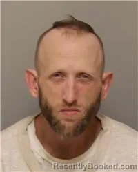 Mugshot of BRYAN DANIEL MACHO booked in Anoka County, Minnesota on April 2, 2026