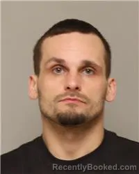 Mugshot of TRAVIS ROBERT TAYLOR booked in Anoka County, Minnesota on April 3, 2026