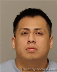 Mugshot of JONATHAN GONZALO JADAN booked in Anoka County, Minnesota on April 8, 2026