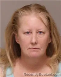 Mugshot of KATHARINE MARY SAVAGE booked in Anoka County, Minnesota on April 8, 2026