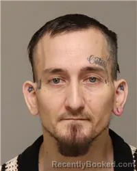 Mugshot of TYLER RAY HARAZIN booked in Anoka County, Minnesota on April 8, 2026