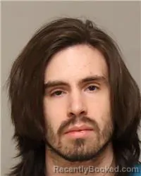 Mugshot of NICHOLAS JAMES SIRMANS booked in Anoka County, Minnesota on April 10, 2026