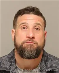 Mugshot of RANDALL JOSEPH ROMANO booked in Anoka County, Minnesota on April 11, 2026