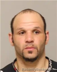 Mugshot of DUSTIN CHARLES ADAMS-POWELL booked in Anoka County, Minnesota on April 25, 2026