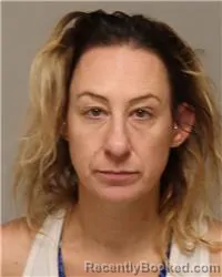 Mugshot of ASHLEY LEE JENSEN booked in Anoka County, Minnesota on April 27, 2026