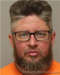 Mugshot of ROBERT THOMAS SIEDSCHLAG booked in Anoka County, Minnesota on April 28, 2026