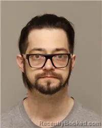 Mugshot of ANDREW MAYLON GUSTAFSON booked in Anoka County, Minnesota on April 30, 2026