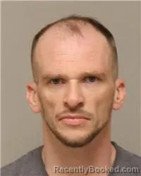 Mugshot of JONATHAN SCOTT DAVIS booked in Anoka County, Minnesota on May 7, 2026
