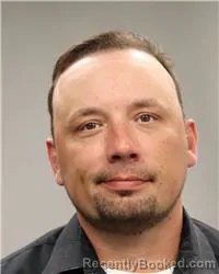 Mugshot of NATHAN ALAN ROOT booked in Anoka County, Minnesota on May 7, 2026