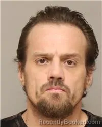Mugshot of JOSEPH WILLIAM REYNOLDS booked in Anoka County, Minnesota on May 10, 2026