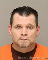 Mugshot of JUSTIN SAMUEL SCHADEN booked in Anoka County, Minnesota on May 12, 2026