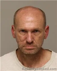 Mugshot of JOHN NELS JOHNSON booked in Anoka County, Minnesota on May 13, 2026