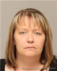 Mugshot of JENNIFER RAE CHAPMAN booked in Anoka County, Minnesota on May 14, 2026