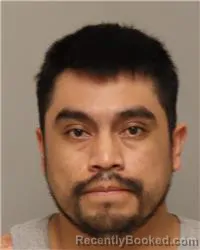 Mugshot of JUAN OLGUIN-CHAVEZ booked in Anoka County, Minnesota on May 14, 2026