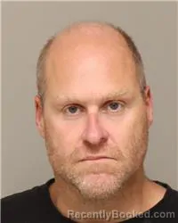 Mugshot of RICHARD ROBERT RADOUSH booked in Anoka County, Minnesota on May 19, 2026