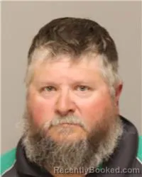 Mugshot of DANIEL CHARLES OLSON booked in Anoka County, Minnesota on May 21, 2026