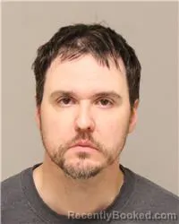 Mugshot of AARON KELLY VEEK booked in Anoka County, Minnesota on May 22, 2026