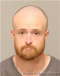 Mugshot of RYAN ANDREW COLLINS booked in Anoka County, Minnesota on May 26, 2026