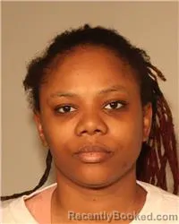 Mugshot of TERRISA IQUIIE BLACK booked in Anoka County, Minnesota on June 11, 2026