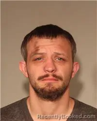 Mugshot of JOSHUA MICHAEL THEIS booked in Anoka County, Minnesota on June 16, 2026