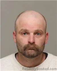 Mugshot of CHARLES WILLIAM EAKMAN booked in Anoka County, Minnesota on June 17, 2026