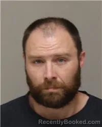 Mugshot of AARON JAMES SISCO booked in Anoka County, Minnesota on June 23, 2026