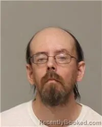 Mugshot of AARON DUTCH SCHULTZ booked in Anoka County, Minnesota on June 25, 2026