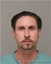 Mugshot of ZACHARY JOSEPH ROY DEVINE booked in Anoka County, Minnesota on June 27, 2026