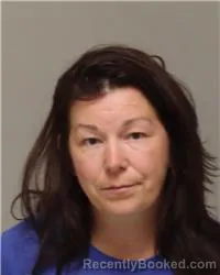 Mugshot of JUSTINE MARIE KINARD booked in Anoka County, Minnesota on June 28, 2026