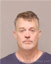 Mugshot of MICHAEL DUANE MCKENZIE booked in Anoka County, Minnesota on July 2, 2026