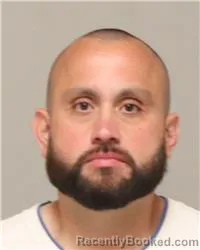 Mugshot of JOSHUA JAMES PACHECO booked in Anoka County, Minnesota on July 4, 2026
