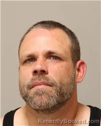 Mugshot of TRAVIS ALLAN JENSEN booked in Anoka County, Minnesota on July 8, 2026