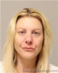 Mugshot of NATALIE FAYE SCOTT booked in Anoka County, Minnesota on July 8, 2026