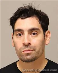 Mugshot of Angel Eduardo Riera booked in Anoka County, Minnesota on July 26, 2026