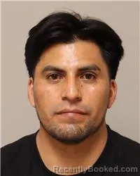 Mugshot of Juan Carlos Guaman Alvarez booked in Anoka County, Minnesota on July 26, 2026