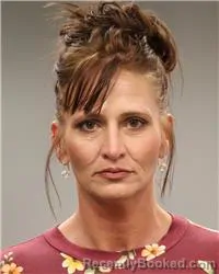 Mugshot of Jennifer Danielle Delp booked in Anoka County, Minnesota on August 7, 2026
