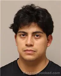 Mugshot of Zeus Josue Caguano Mayorga booked in Anoka County, Minnesota on August 8, 2026