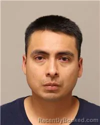 Mugshot of Moises Alejandro Mendieta Buestan booked in Anoka County, Minnesota on August 9, 2026