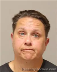 Mugshot of Jennifer Joann Bunker Devine booked in Anoka County, Minnesota on August 12, 2026