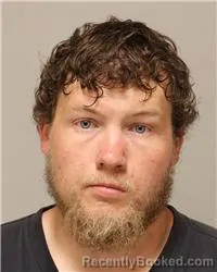 Mugshot of Jarik Christopher Pulczinski booked in Anoka County, Minnesota on August 12, 2026