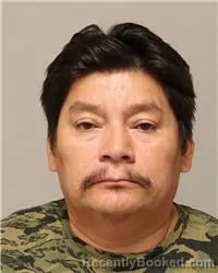 Mugshot of Isaias Aquino Mendoza booked in Anoka County, Minnesota on August 17, 2026