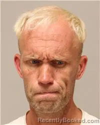 Mugshot of Adam Jeffery Jonell booked in Anoka County, Minnesota on August 21, 2026
