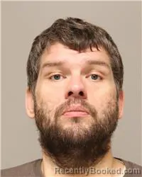 Mugshot of Aaron Paul Melina booked in Anoka County, Minnesota on September 25, 2026