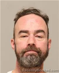 Mugshot of Erik Lee Chommie booked in Anoka County, Minnesota on October 4, 2026