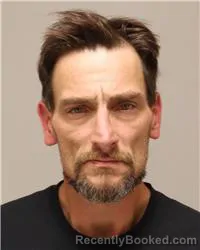 Mugshot of Christopher John Reynolds booked in Anoka County, Minnesota on October 4, 2026