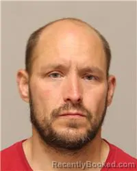 Mugshot of Anthony David Benner booked in Anoka County, Minnesota on October 12, 2026