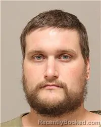 Mugshot of Kyle David Esnough booked in Anoka County, Minnesota on October 13, 2026