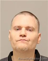 Mugshot of Scott Matthew Enright booked in Anoka County, Minnesota on October 13, 2026