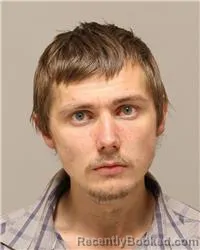Mugshot of Luca William Daniels booked in Anoka County, Minnesota on October 14, 2026